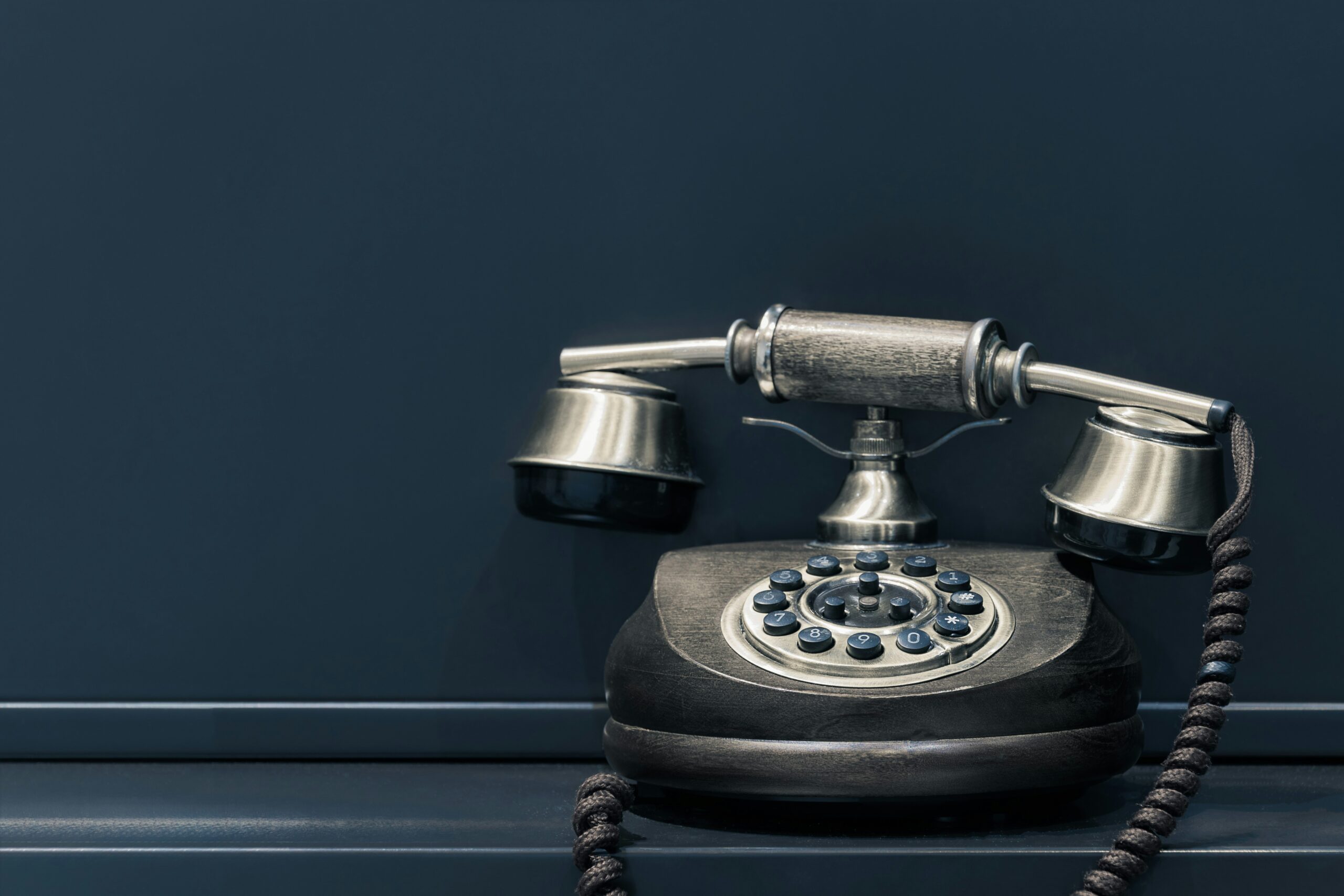 Rotary phone sitting on desk